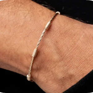 PULSERA  ENTORCHADA 7 NUDOS DORADA