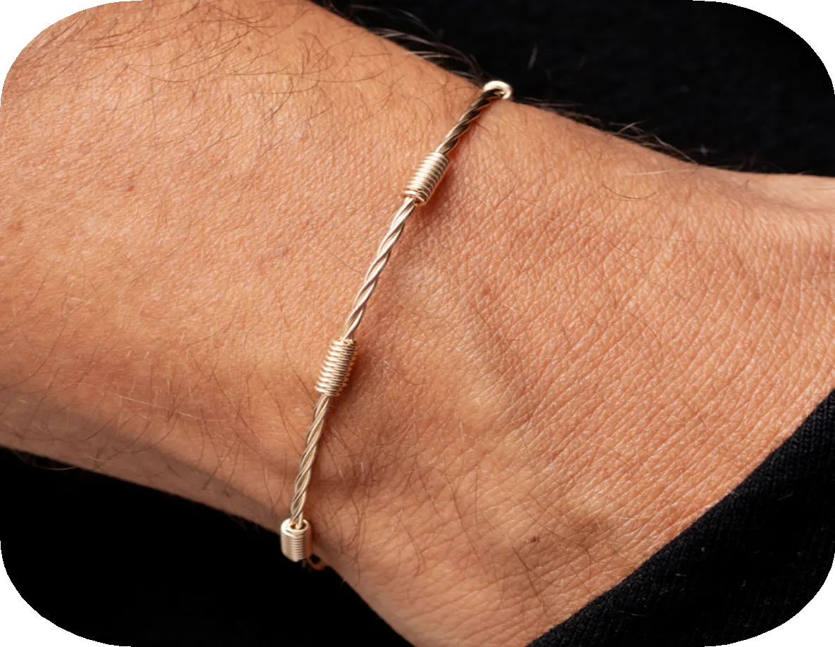 PULSERA ENTORCHADA 7 NUDOS DORADA